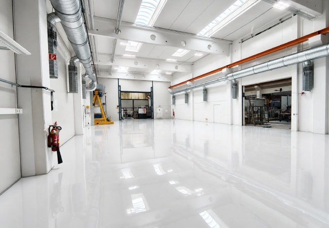 Wonclean Germany cleanroom project photo showing clean interior finishing, wall panel surfaces, overhead ducts and glossy floor finish